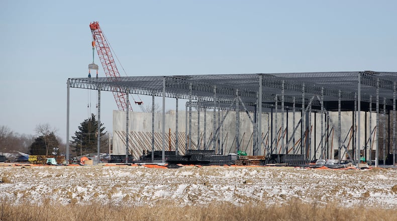 Pet retailer Chewy is opening a new fulfillment center near Dayton International Airport that officials originally said would bring about 600 new jobs. Chewy expects to move in by the end of June. The new building has the capacity for around 1,500 workers. TY GREENLEES / STAFF