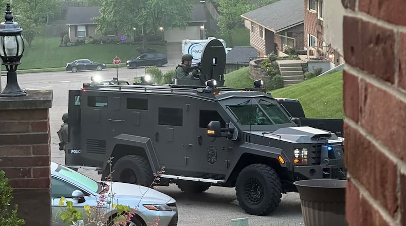 SWAT crews were on scene Sunday morning, May 5, 2024, on Kings Cross Court in West Carrollton for a man yelling out his door who reportedly made threats to shoot police. Karen Korn/CONTRIBUTED