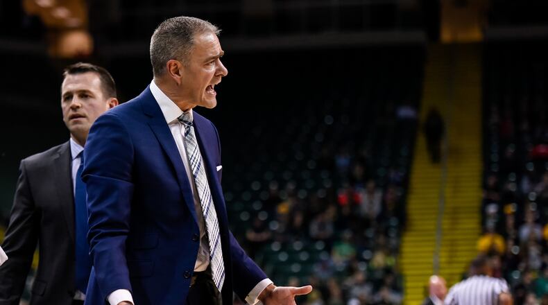 Wright State University head men’s basketball coach Scott Nagy stands on the sideline during the first half of their game against Miami University at the Nutter Center at Wright State University in Fairborn. NICK GRAHAM/STAFF