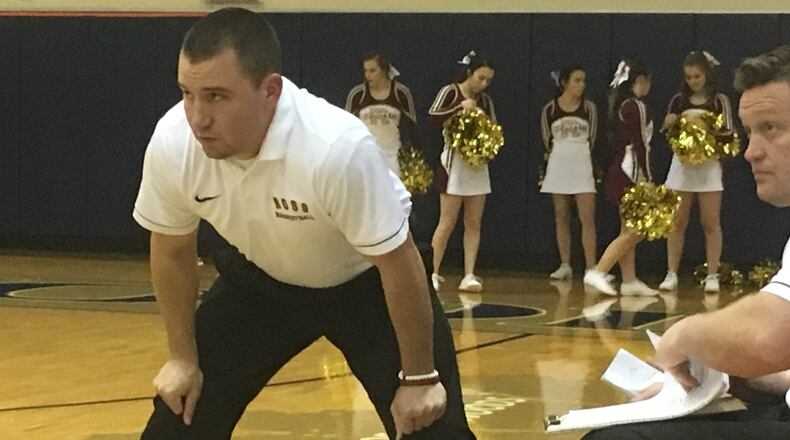 Ross coach David Lane keeps a close eye on the action during his team’s 69-65 overtime victory at Edgewood on Dec. 22, 2017. RICK CASSANO/STAFF