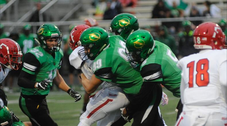 Northmont defensive lineman Gabe Newburg makes a tackle against Fairfield during the 2017 season.