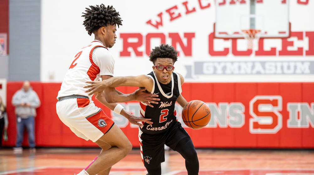 The West Carrollton High School boys basketball team beat Stebbins 46-41 on Friday, Feb. 13 at Ron Coleman Gymnasium in Riverside. MICHAEL COOPER / STAFF