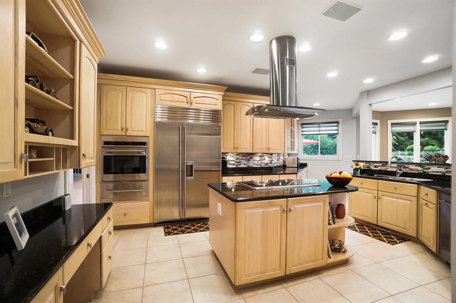 Photos: $1M luxury home listed has waterfall, swimming pool and kitchen to die for
