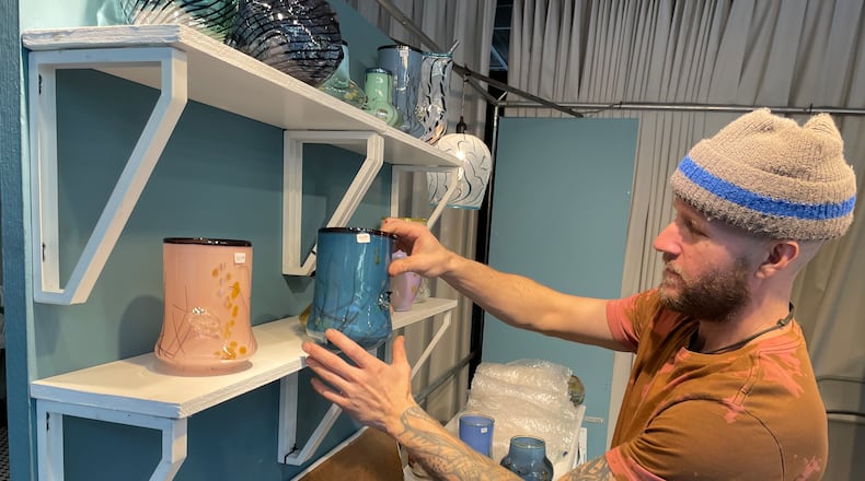 Vendors were busy setting up Wednesday, Dec. 6 for the kick off of Holly Days at the Arcade. NATALIE JONES/STAFF