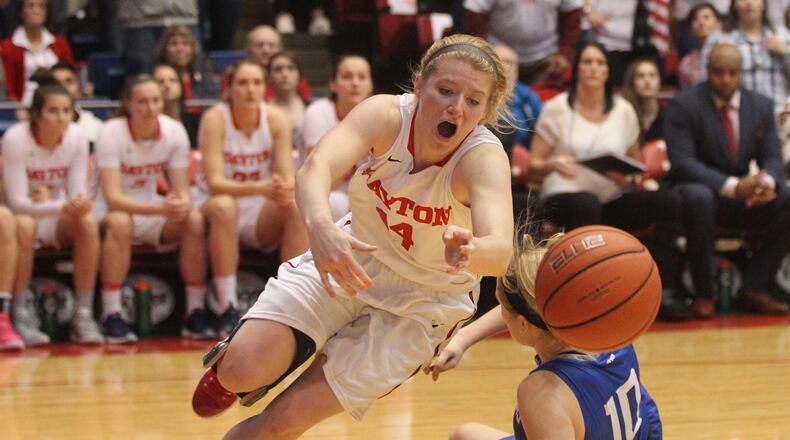 Jenna Burdette (14) goes after a loose ball during Dayton against Saint Louis on Feb. 22, 2017, at UD Arena. David Jablonski/Staff