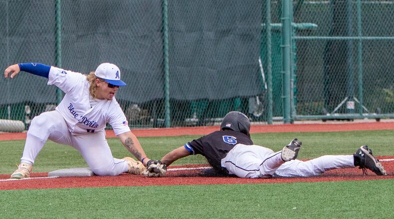 Brookville third baseman Hunter Gray tags out a Cincinnati Christian base stealer on a throw from catcher Kayde Baker during Thursday's Division III region semifinal at Wright State. Jeff Gilbert/CONTRIBUTED
