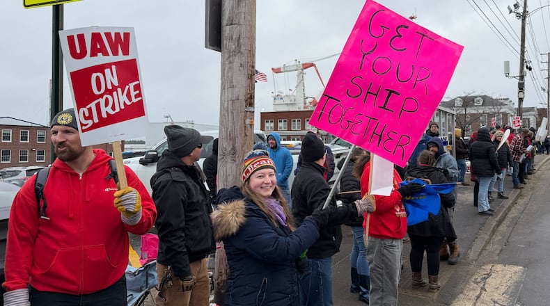FILE - Striking workers stage picket line outside Bath Iron Works in Bath, Maine, on Monday, May 23, 2026. (AP Photo/Rodrique Ngowi, File)