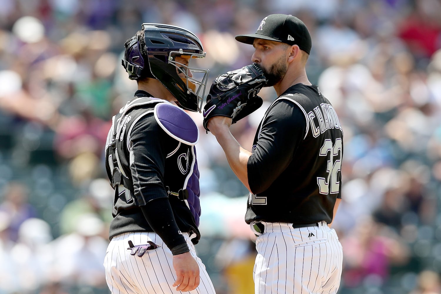 PHOTOS: Reds pile up 13 hits, beat the Rockies
