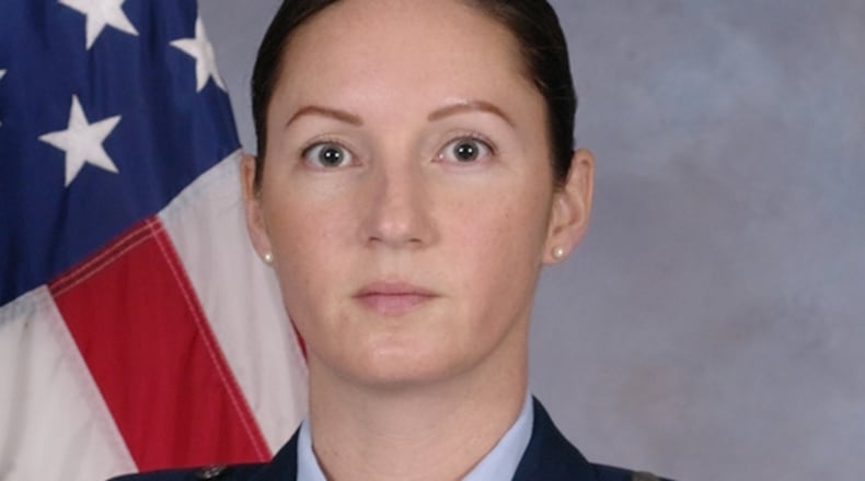 Maj. Julie Roloson 
Commander
88th Security Forces Squadron