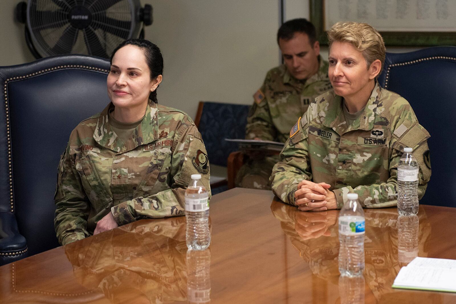 Brig. Gen. Alice Trevino (left), Air Force Installation Contracting Center commander, and Army Brig. Gen. Christine Beeler, commander of Mission and Installation Contracting Command, listen as a team explains its work processes during the joint force contracting exercise June 24 at Wright-Patterson Air Force Base. U.S. AIR FORCE PHOTO/WESLEY FARNSWORTH