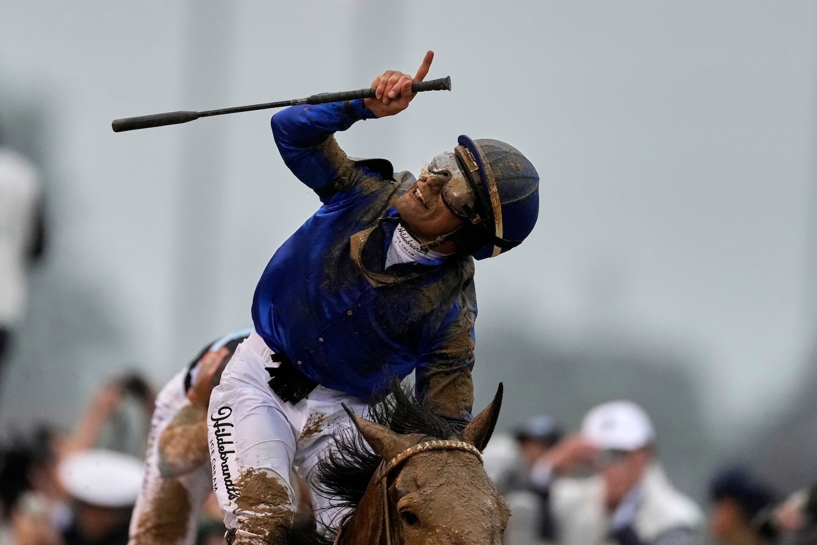 Jockey Junior Alvarado celebrates after riding Sovereignty to victory in the 151st running of the Kentucky Derby horse race at Churchill Downs Saturday, May 3, 2025, in Louisville, Ky. (AP Photo/Brynn Anderson)