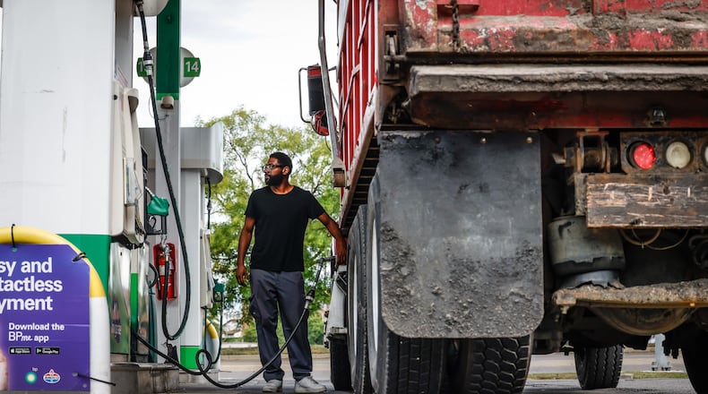 Gerrett Brady said he uses around 30 gallons of diesel a day in his large dump truck for work. Fuel prices have dropped for 11 consecutive weeks but experts say there could be a temporary bump in the road ahead. JIM NOELKER/STAFF