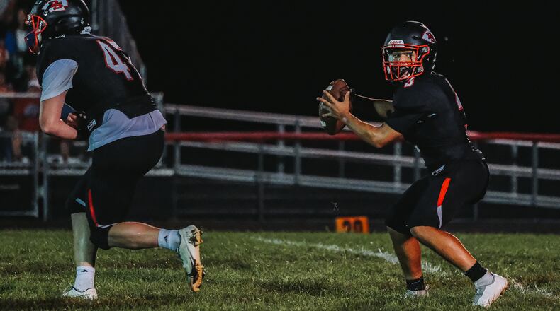 Preble Shawnee junior quarterback Brayden Doran looks to make a pass during a game earlier this season. Champine Photography