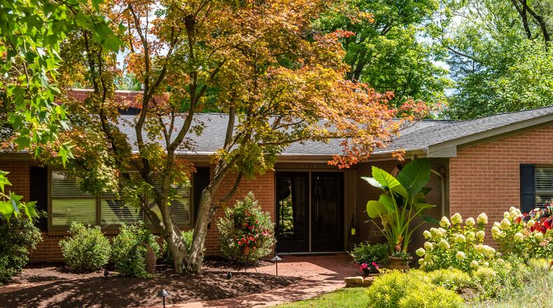 The front entrance to Chuck and Dona Vellas' home is lushly landscaped. Contributed