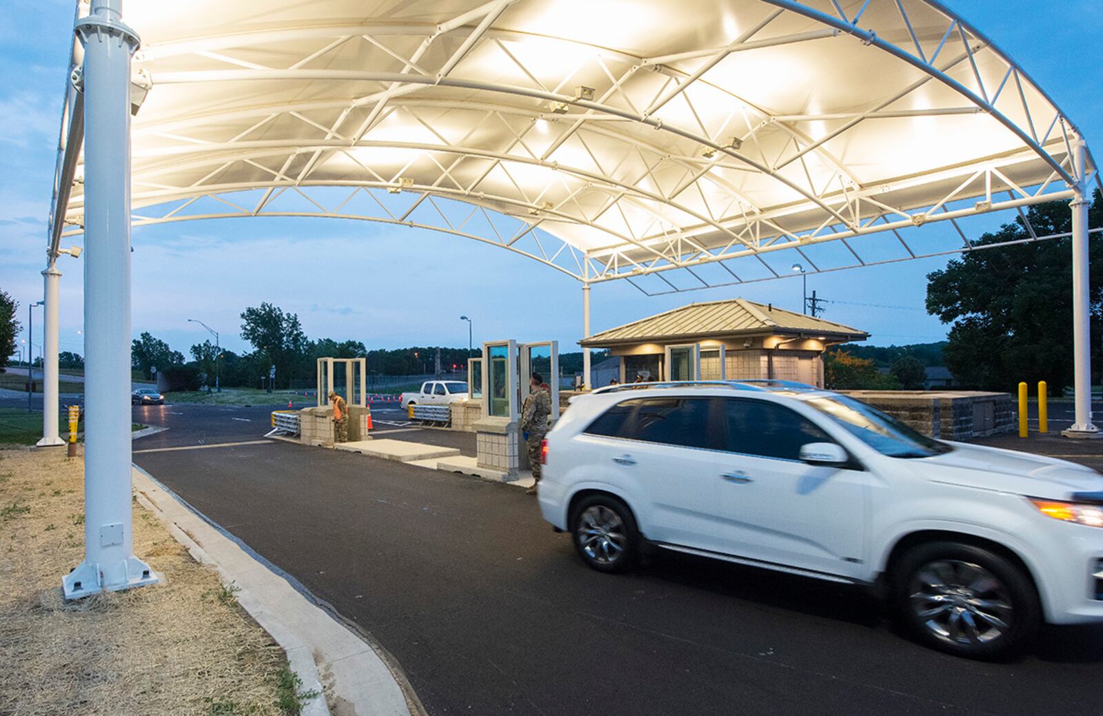 A vehicle passes through Gate 15A at Wright-Patterson Air Force Base on June 21. It was among the first vehicles to use the newly refurbished gate that had been closed for a two-month construction project and upgrade. U.S. AIR FORCE PHOTO/R.J. ORIEZ