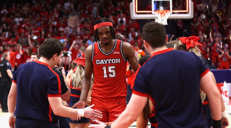 Dayton's DaRon Holmes II leaves the court after a victory against Virginia Commonwealth on Friday, March 8, 2024, at UD Arena. David Jablonski/Staff