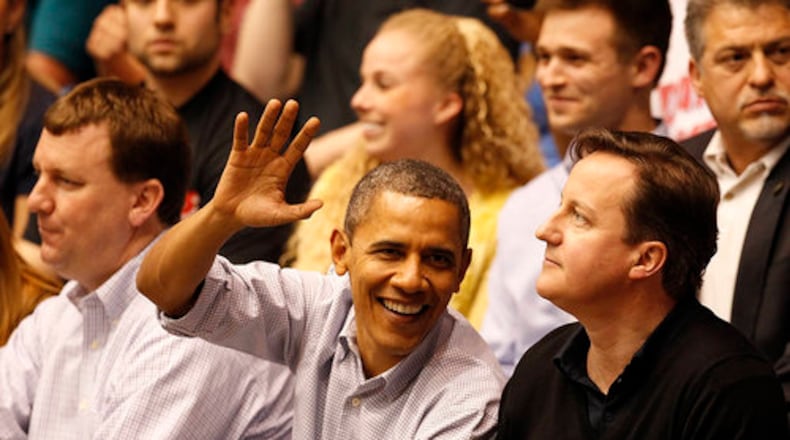 President Obama and David Cameron attend the First Four game at UD Arena.