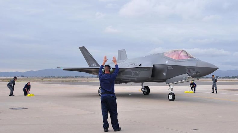 Lockheed Martin and Japanese Air Self-Defense Force personnel work together to taxi in the arrival of the first foreign military sales F-35A onto the 944th Fighter Wing ramp Nov. 28, 2016, at Luke Air Force Base, Ariz. The arrival marked the next step for the international F-35 training program. (U.S. Air Force photo/Tech. Sgt. Louis Vega Jr.)