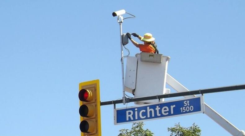 One man used a boom on a bucket truck like this one to visit his mother, who was staying at an Ohio assisted living home.