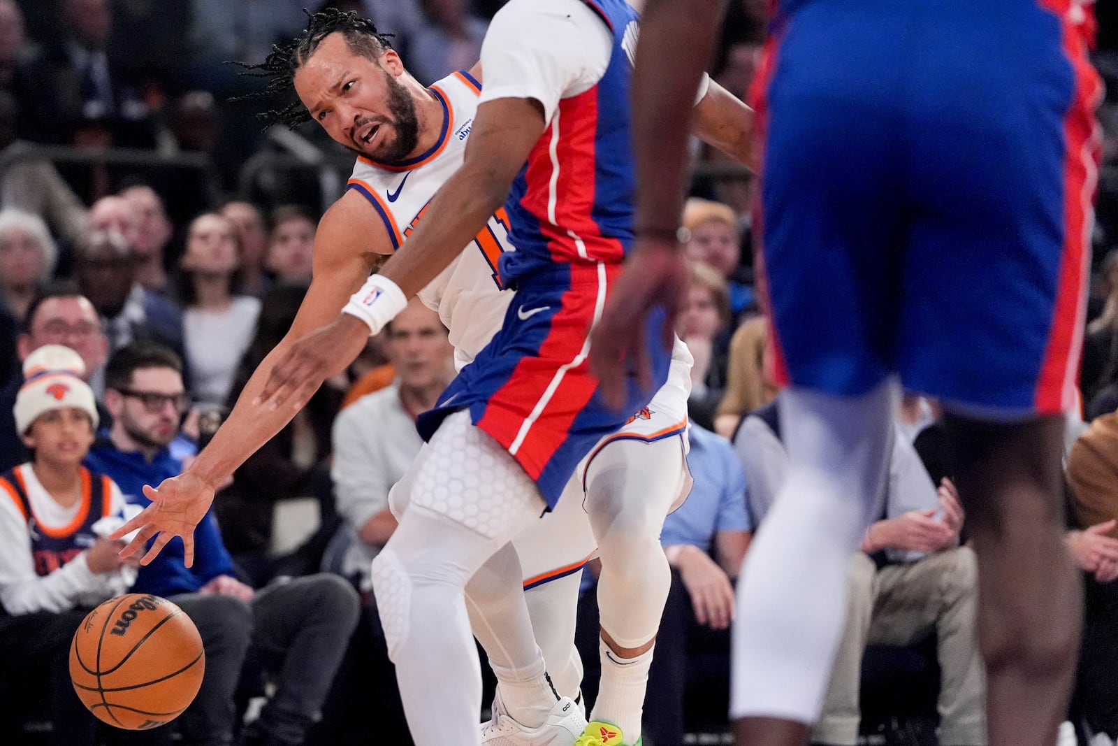 New York Knicks guard Jalen Brunson reaches for the ball during the first half of Game 1 in an NBA basketball first-round playoff series against the Detroit Pistons, Saturday, April 19, 2025, in New York. (AP Photo/Julia Demaree Nikhinson)