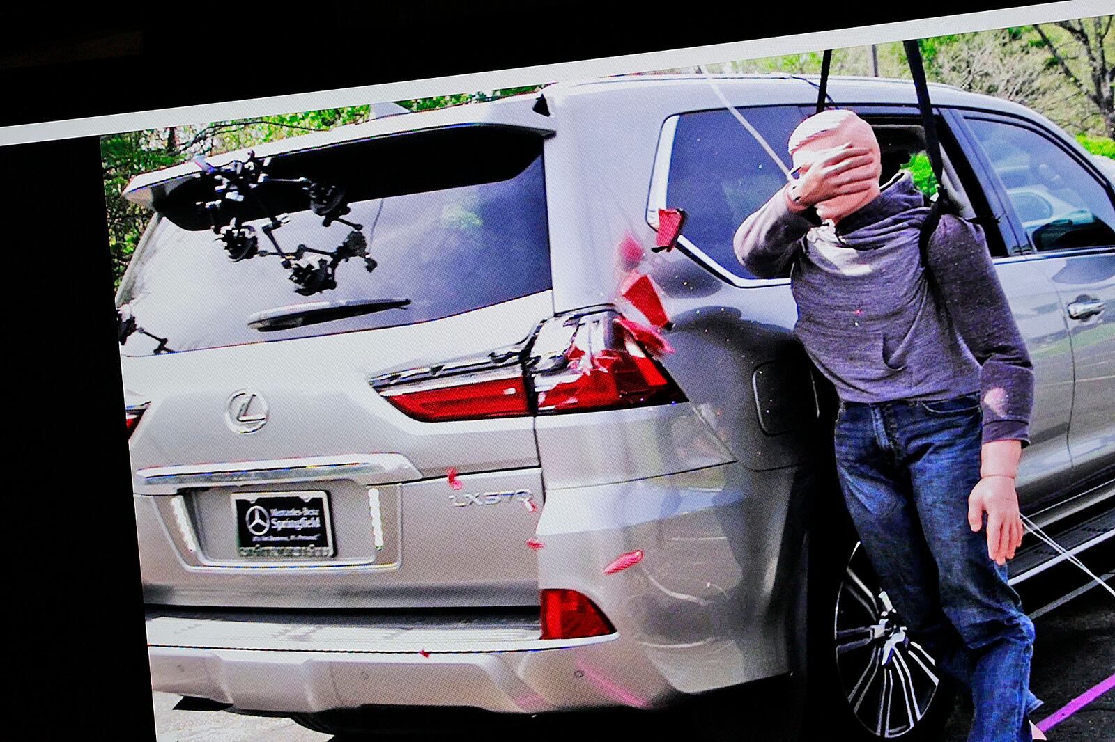 Still images from an ARCCA reconstruction test show the shattering of an SUV taillight during the Karen Read retrial in Norfolk Superior Court on Wednesday, June 11, 2025, Dedham, Mass. (Greg Derr/The Patriot Ledger via AP, Pool)