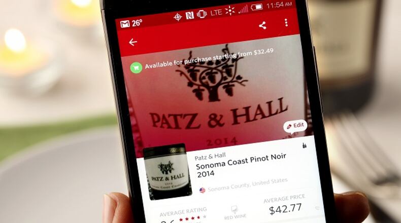 Wine apps such as Vivino, that allow the diner to scan a list or bottle and get recommendations, have become popular in restaurants. Sommeliers say the apps themselves aren't the problem as much as how some diners are dismissive of their offer of expert help. (Michael Tercha/Chicago Tribune/TNS)