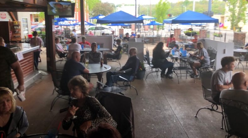 TJ Chumps’ Miamisburg restaurant reopened its patio on Friday, May 15, and the reopening received an enthusiastic response from diners at lunchtime. MARK FISHER/STAFF