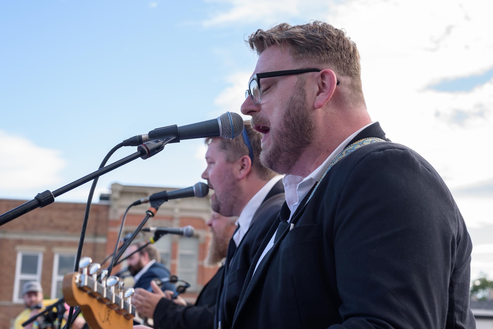 Come Together, a rooftop tribute to The Beatles, performed a free concert atop the historic Mayflower building facing downtown Troy’s Prouty Plaza in celebration of The Troy Foundation’s 100th anniversary on Saturday, June 8, 2024. The group features Dayton area musicians Patrick Himes, Brian Hoeflich, Kent Montgomery, Nathan Peters, Seth Gilliam and Brian Greaney. TOM GILLIAM / CONTRIBUTING PHOTOGRAPHER