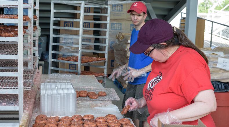 The return of the Troy Strawberry Festival for the first time since 2020 is expected to draw visitors as are several other activities old and new, such as the Great Ohio Bicycle Adventure’s return in June and the Tour de Donut in August, Stewart said. TOM GILLIAM / CONTRIBUTING PHOTOGRAPHER