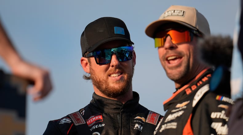 NASCAR Truck driver Garrett Mitchell, better known as "Cleetus McFarland, prepares for a practice at Daytona International Speedway, Thursday, Feb. 12, 2026, in Daytona Beach, Fla. (AP Photo/Mike Stewart)