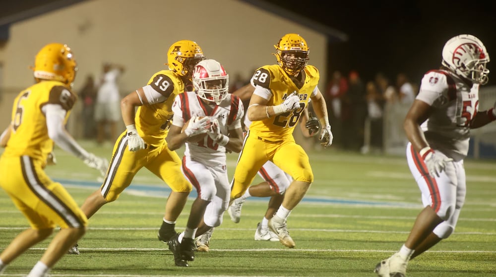 Trotwood-Madison's Daylan Dennis runs for a touchdown against Alter on Friday, Sept. 12, 2025, at Roush Stadium in Kettering. David Jablonski/Staff