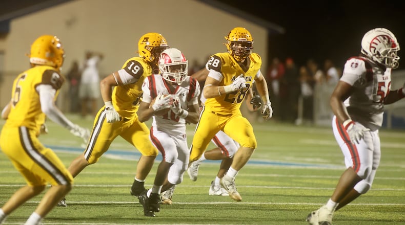 Trotwood-Madison's Daylan Dennis runs for a touchdown against Alter on Friday, Sept. 12, 2025, at Roush Stadium in Kettering. David Jablonski/Staff