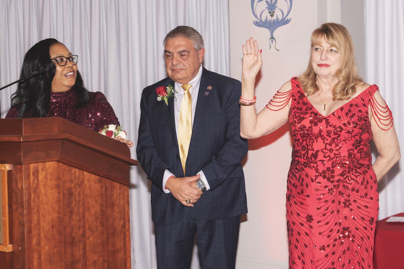Dayton Realtors 2025 president Pat Corle (right) is sworn in by 2023 Ohio Realtors President Ralph Mantica and 2024 Ohio Realtors President Michelle Billings. CONTRIBUTED