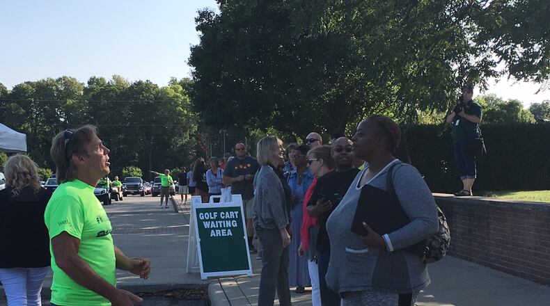 WSU president Cheryl Schrader, volunteers and officials prepare for move-in day at the university.