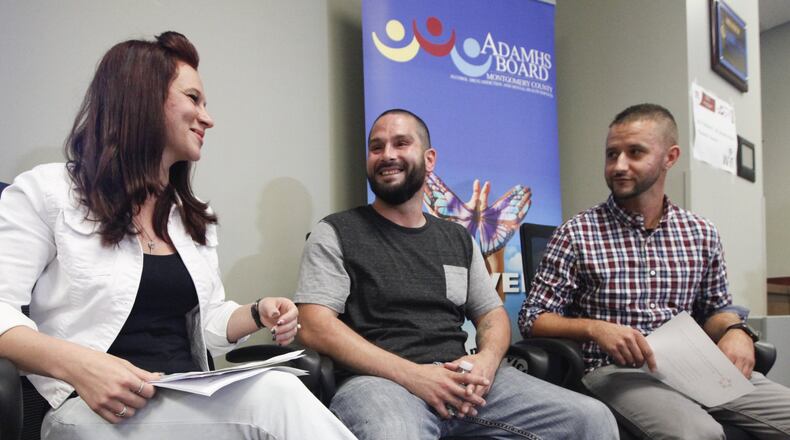 Recovering drug users Sarah Northrop-Fowler, Andrew Leadford and Cory Kabara (right), all discussed the importance of recovery housing Thursday at a Community Overdose Action Team monthly update. CHRIS STEWART / STAFF