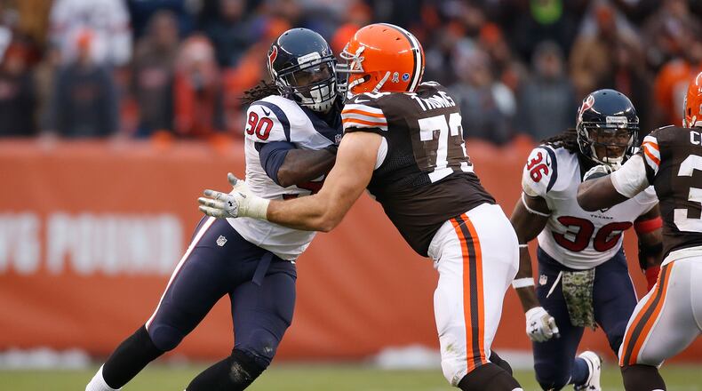 CLEVELAND, OH - NOVEMBER 16: Jadeveon Clowney #90 of the Houston Texans tries to get past Joe Thomas #73 of the Cleveland Browns during the fourth quarter at FirstEnergy Stadium on November 16, 2014 in Cleveland, Ohio. (Photo by Gregory Shamus/Getty Images)
