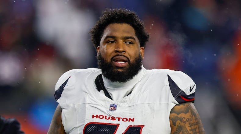 Houston Texans offensive tackle Tytus Howard (71) reacts during the first half of an NFL divisional playoff football game against the New England Patriots, Sunday, Jan. 18, 2026, in Foxborough, Mass. (AP Photo/Greg M. Cooper)