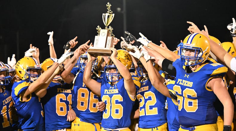 Marion Local junior Andrew Schmackers runs during a 98-yard kickoff return for a touchdown late in the third quarter of a 7-6 win over Coldwater in a Midwest Athletic Conference game on Friday, Oct. 24 at Booster Stadium in Maria Stein. BRYANT BILLING / STAFF