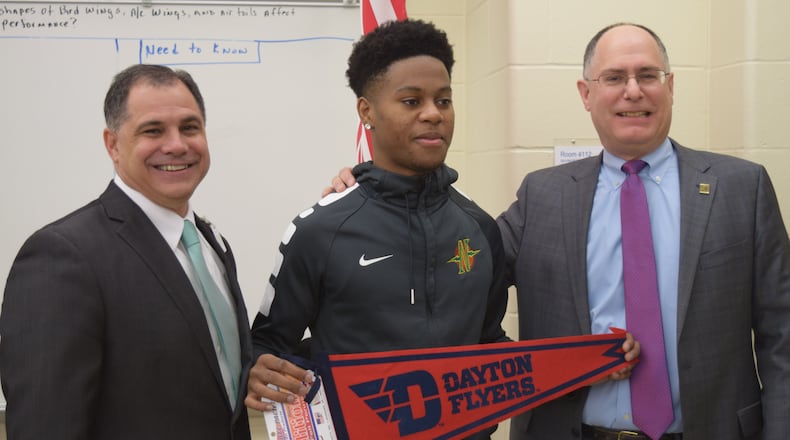 Northmont Superintendent Tony Thomas (left), Cameron Rucker and University of Dayton President Eric Spina. CONTRIBUTED PHOTO