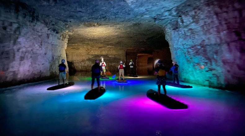Guests can embark upon a stand up paddleboard tour at the Gorge Underground in Rogers, Kentucky.