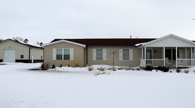 The 5-acre property includes a vinyl-sided ranch home with about 1,620 sq. ft. of living space. There is also a metal barn with 11 stalls and a storage building. CONTRIBUTED PHOTO BY KATHY TYLER