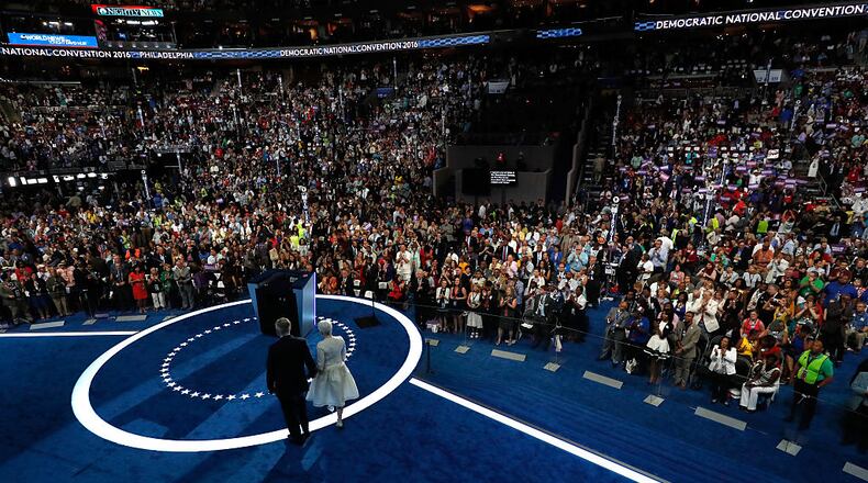 PHILADELPHIA, PA - JULY 27: U.S. Sen. Minority Leader Sen. Harry Reid (D-NV) along with his wife Landra Gould, arrive on stage during the third day of the Democratic National Convention at the Wells Fargo Center, July 27, 2016 in Philadelphia, Pennsylvania. Democratic presidential candidate Hillary Clinton received the number of votes needed to secure the party's nomination. An estimated 50,000 people are expected in Philadelphia, including hundreds of protesters and members of the media. The four-day Democratic National Convention kicked off July 25. (Photo by Win McNamee/Getty Images)