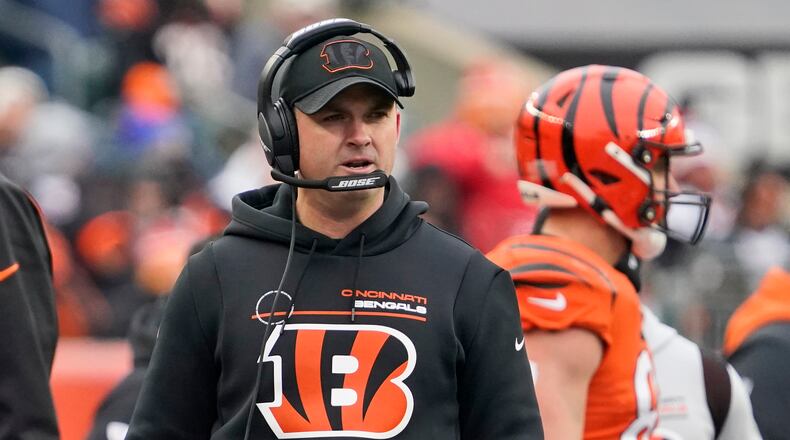 Cincinnati Bengals head coach Zac Taylor looks on during the first half of an NFL football game against the Kansas City Chiefs, Sunday, Jan. 2, 2022, in Cincinnati. (AP Photo/Jeff Dean)