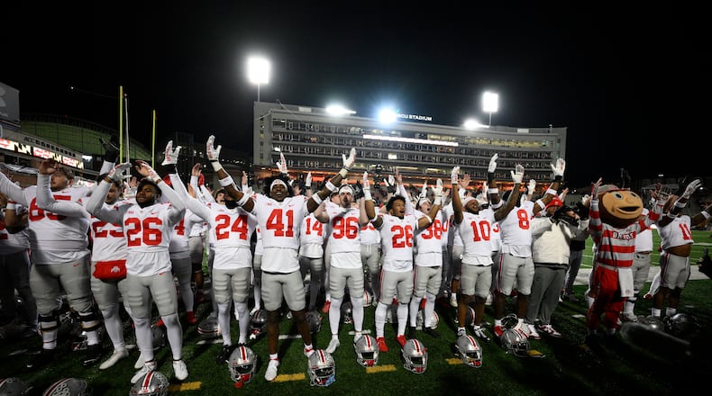Ohio State celebrates after an NCAA college football game against Maryland, Saturday, Nov. 19, 2022, in College Park, Md. Ohio State won 43-30. (AP Photo/Nick Wass)