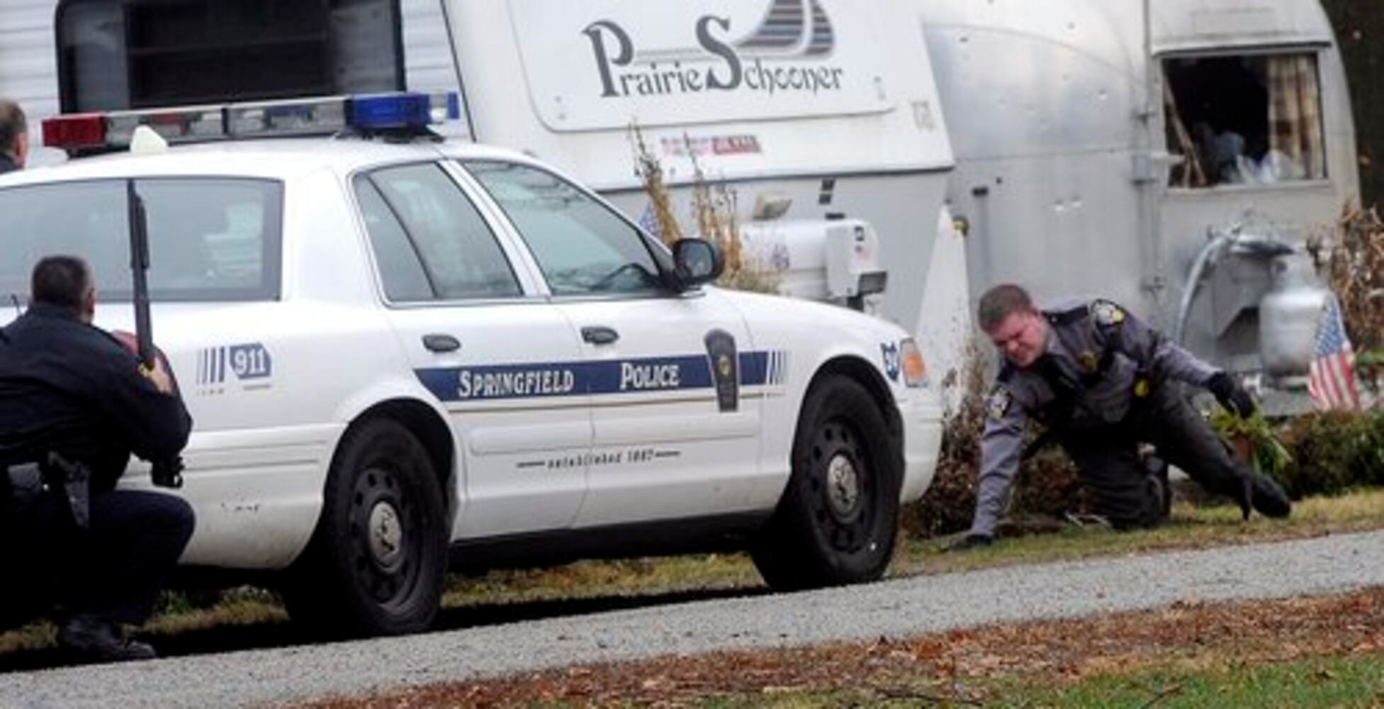 Patrolman shot at Enon Beach