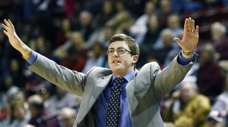 Tyler Summitt signals to his players during an NCAA college basketball game in 2014. AP PHOTO