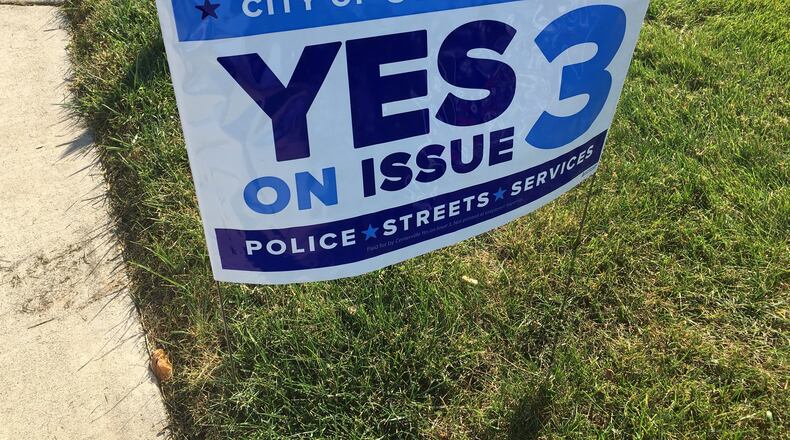 Campaign sign for Issue 3 in Centerville. Residents are being asked to approve a .5 percent earned income tax increase on the Nov. ballot. TREMAYNE HOGUE/STAFF