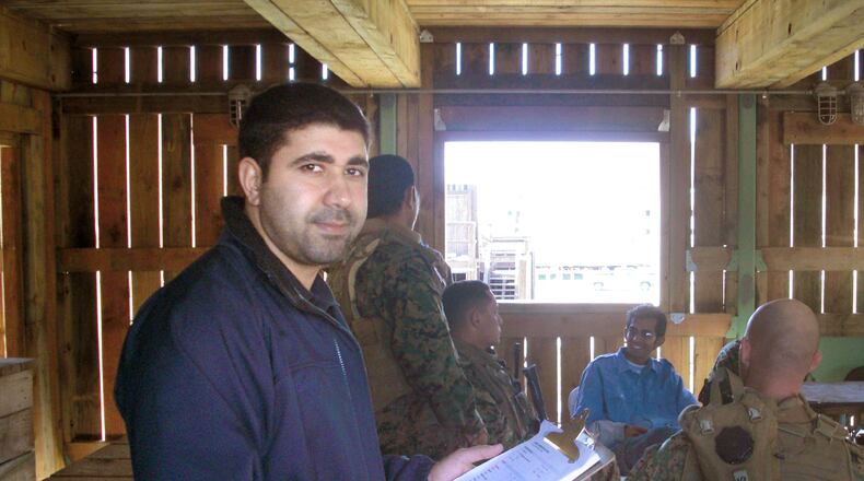 Mohamed Al-Hamdani helps train U.S. marines preparing to deploy from Camp Pedleton to Iraq after the surge. Al-Hamdani came to Dayton as a refugee from Iraq in 1992 with his family and worries recent executive orders will make it harder for other refugees fleeing the country.