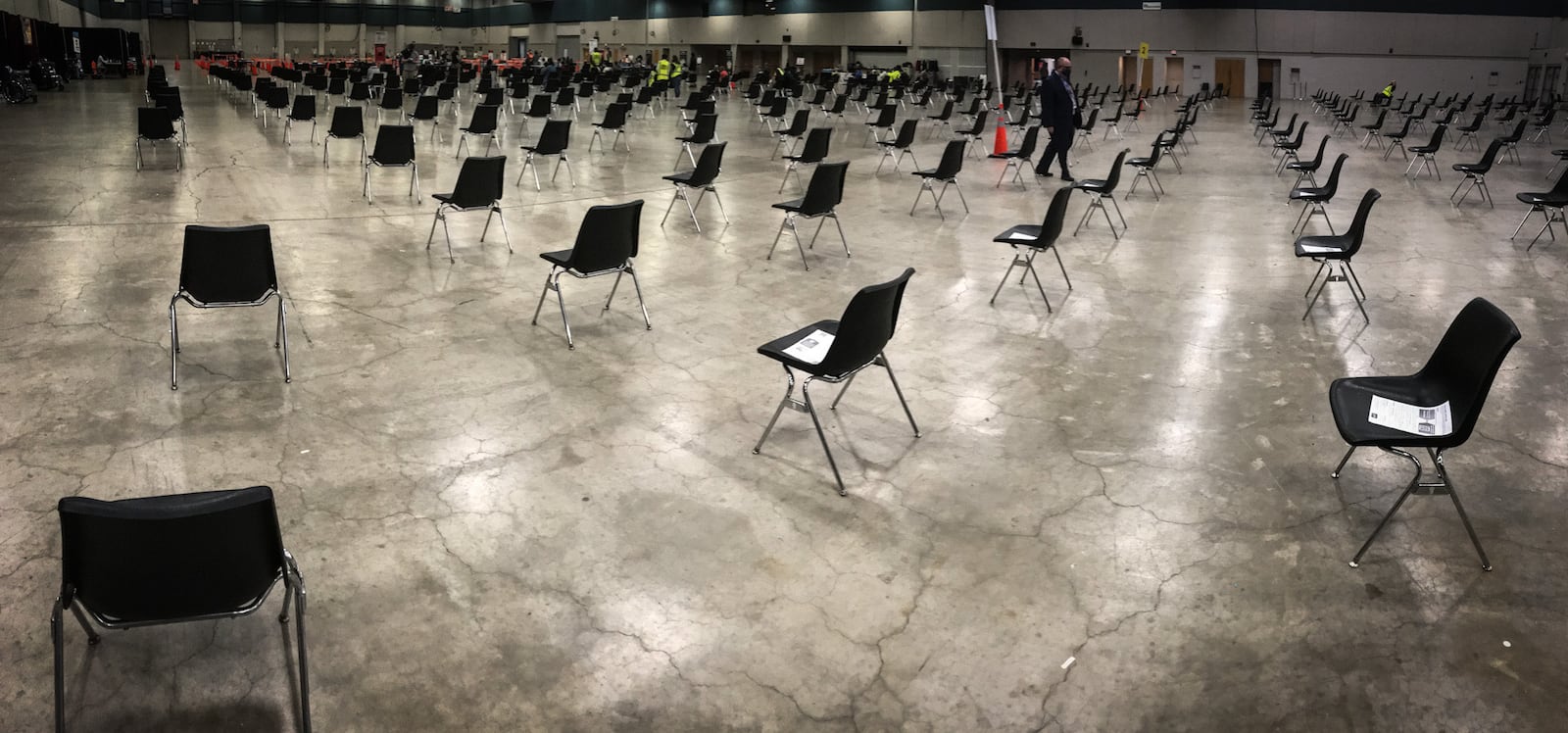 Chairs set up April 15, 2021, for a COVID-19 vaccination clinic at the Dayton Convention Center. Volunteers with Public Health - Dayton & Montgomery County's region of the Ohio Medical Reserve Corps helped provide support to the county during the COVID-19 pandemic. Public Health is now looking to build up its base of volunteers since a number of those volunteers have dropped off since the pandemic ended. STAFF FILE