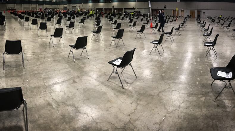 There was no line Thursday afternoon, April 15, 2021, for the COVID-19 vaccination clinic open until 6 p.m. at the Dayton Convention Center. Walk-ins are welcome for the Public Health - Dayton & Montgomery County clinic administering the Pfizer vaccine to those 16 and older. JIM NOELKER / STAFF